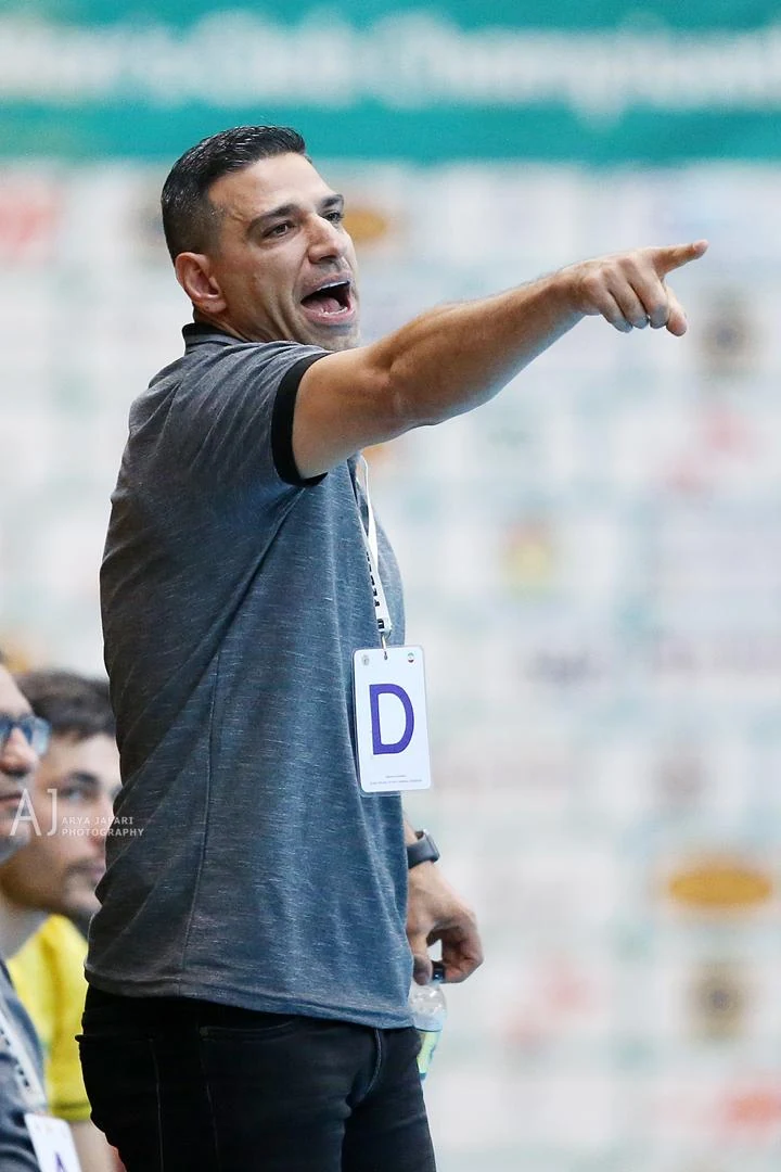 Mehdi Ghashghaei Rad directing play during competition